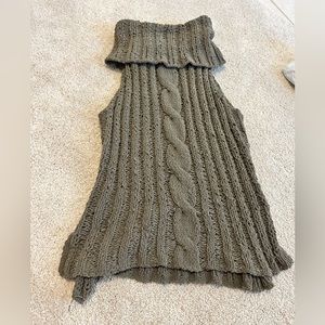 Olive sleeveless sweater.